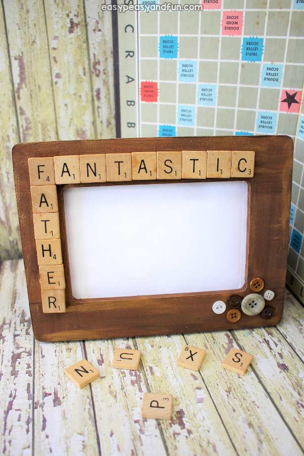 Fathers-Day-Scrabble-Tile-Frame A wooden picture frame decorated with words made from Scrabble tiles