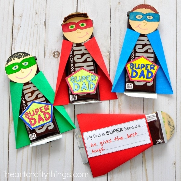 Super Dad Superheroes are made with Hershey's bars as the bodies as an example of father's day gifts for kids