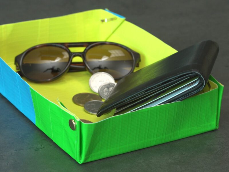 Duct Tape Tray Neon colored tray made of duct tape holding wallet, keys, sunglasses as an example of father's day gifts for kids