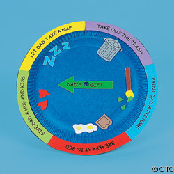 Father’s Day Wheel A paper plate is painted blue. It has an arrow in the middle that can be spun to point to different chores as an example of father's day gifts for kids