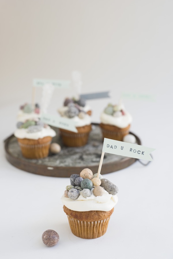 You Rock Cupcake Cupcakes with edible rocks on them that say Dad U Rock.