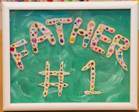 Father’s Day Sculpture The words Father and Number One are molded from clay and decorated with gems.
