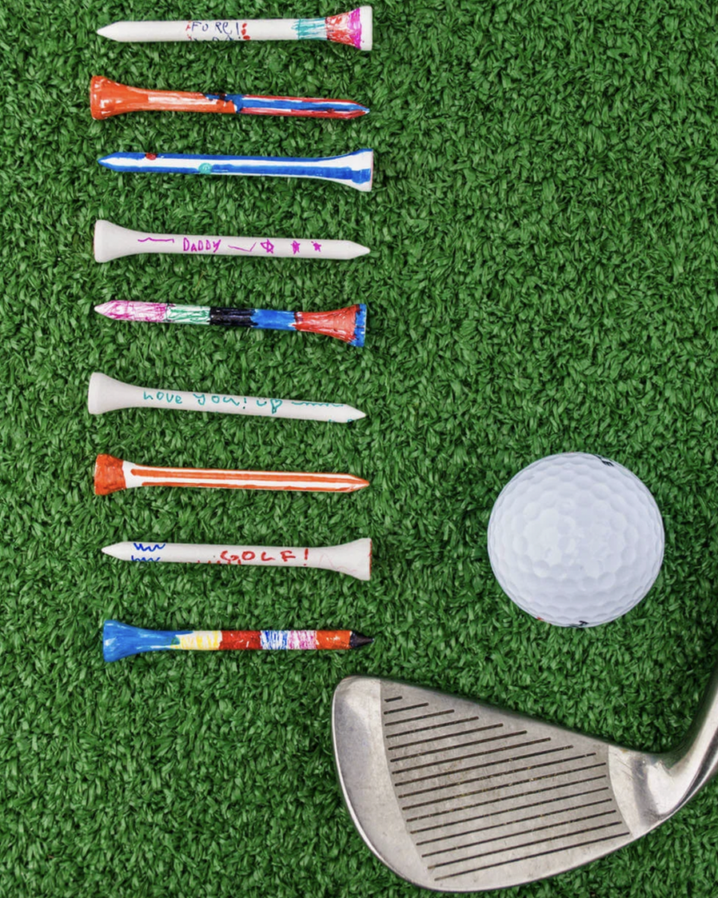 Painted-Golf-Tees Several painted tees are shown. A golf club and ball are also shown