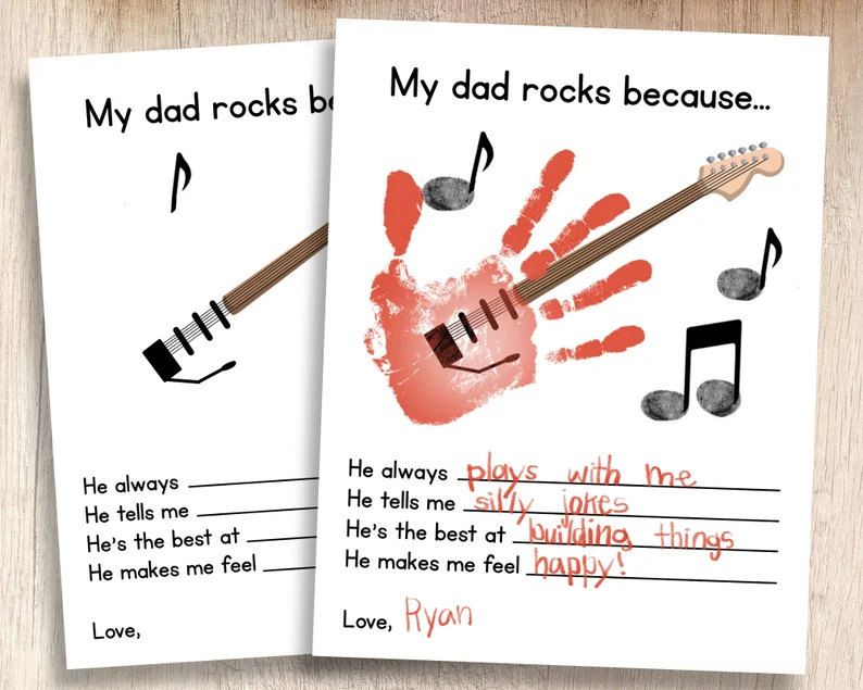 MyDadRocks Two pieces of paper are shown. One has a handprint turned into a guitar on it. It says My Dad rocks because...