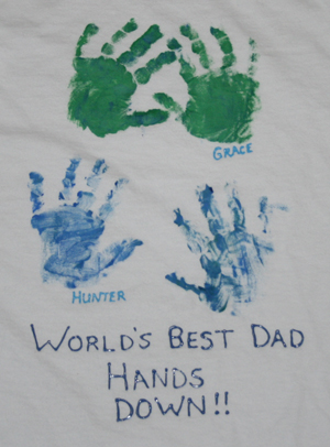 Dad-Shirt A shirt has children's fingerprints and names on it in this example of Father's Day crafts for kids.