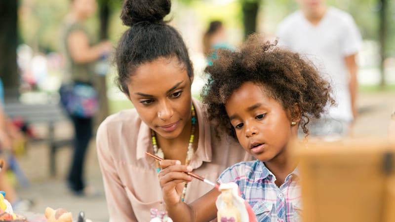 Painting a sculpture. Family Engagement Tips