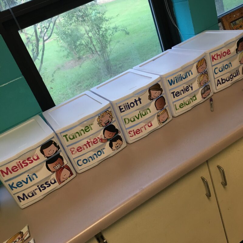 Row of DIY classroom mailboxes.