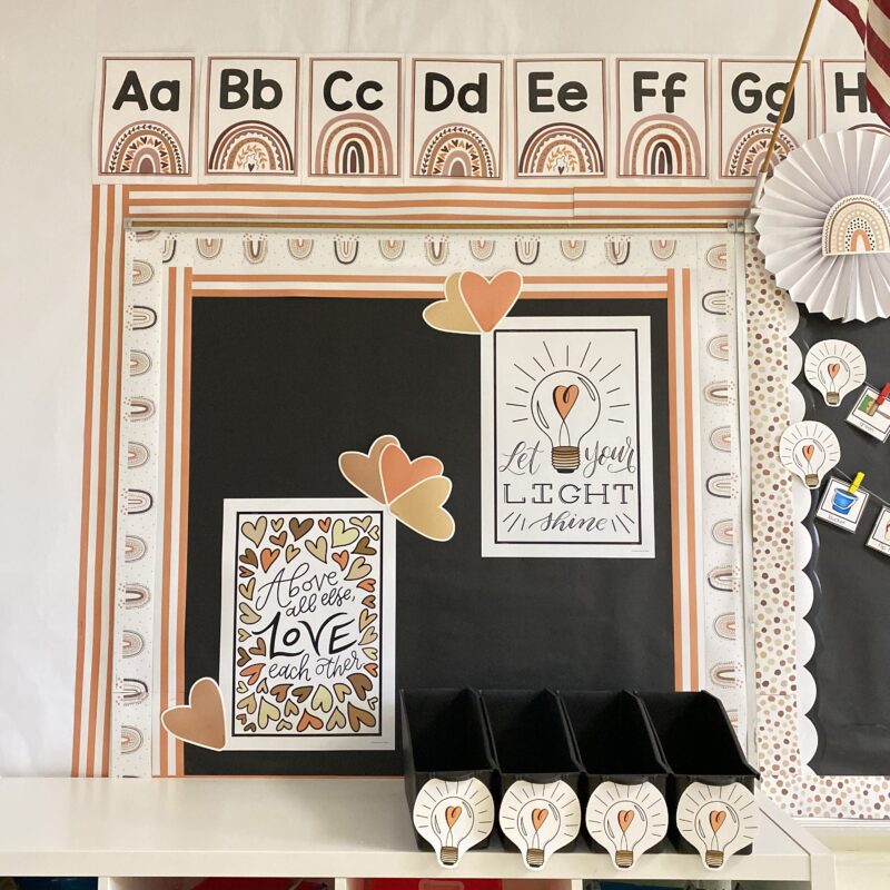 Boho rainbow classroom decor with bulletin board and magazine files.