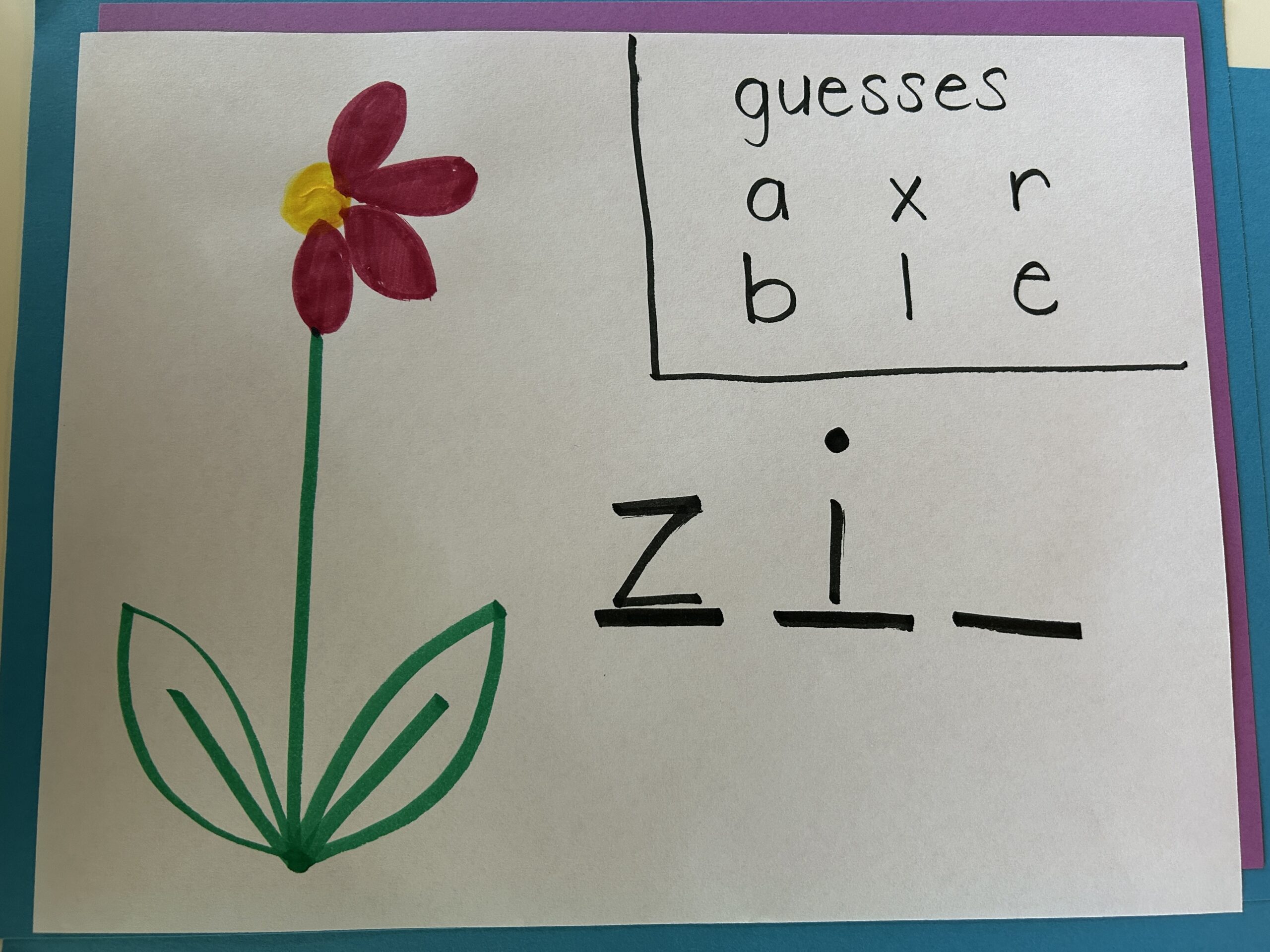 Drawing of a flower as part of a hangman style phonics activity.