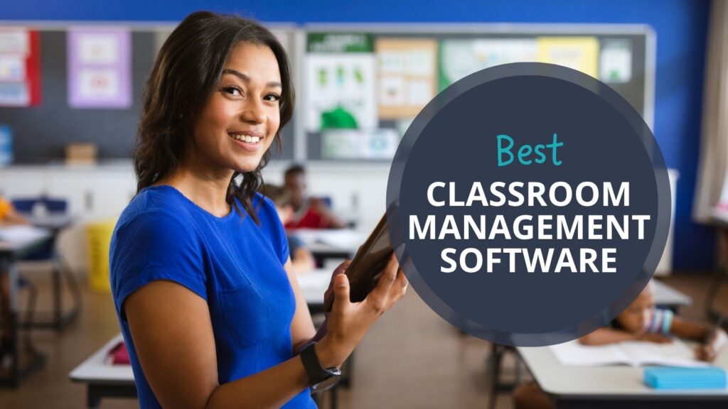 Best Classroom Management Software: A teacher holds a tablet as she stands in front of a classroom of students