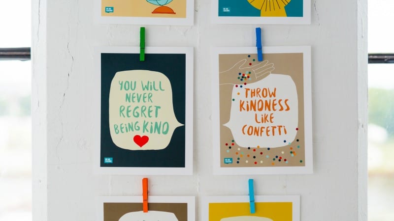 Two kindness posters hanging on classroom wall. 