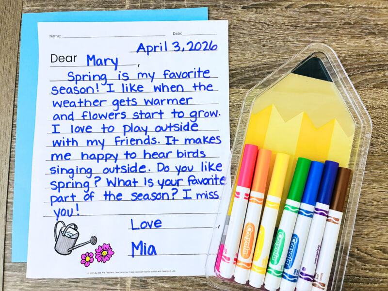 an image of a student created friendly letter next to a group of colorful markers