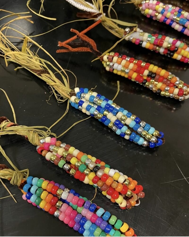 Colorful ears of corn made from beads and raffia