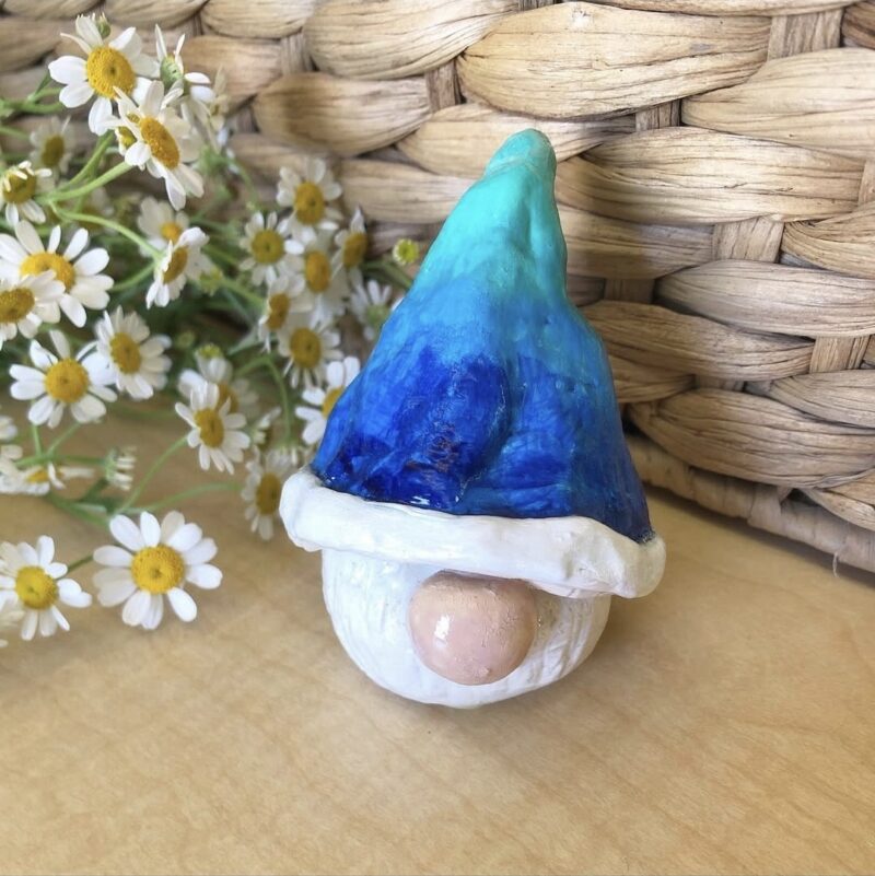 Simple clay gnome head with a blue ombre hat