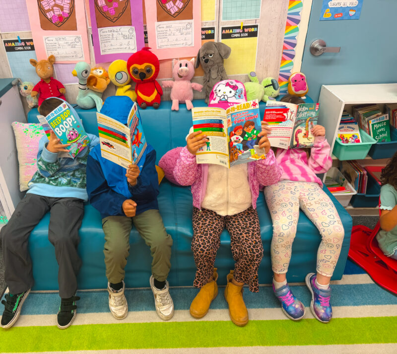 Students and Simon & Schuster Ready to Read books