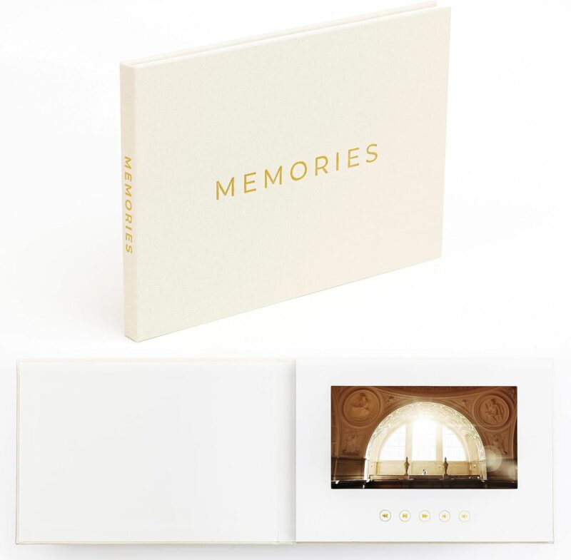 Motion-activated video book with an ivory cover labeled memories